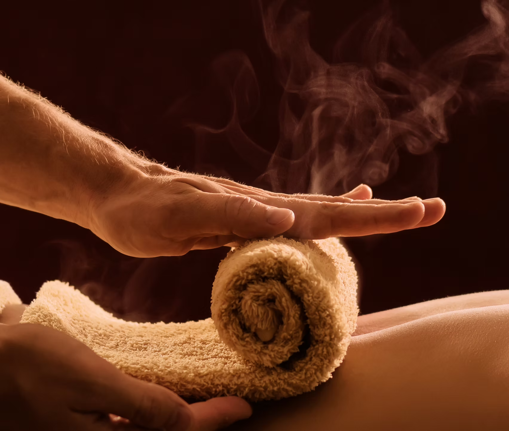 Warm hot towel massage treatment at Radiance Beauty